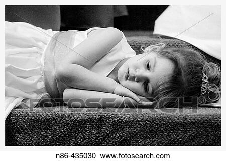 Flower girl at wedding sleeping during ceremony View Large Photo Image Stock Image - Flower girl at wedding sleeping during ceremony. Fotosearch