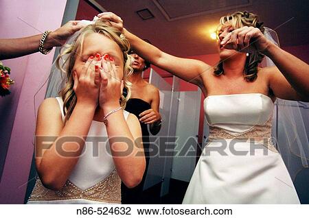 Flower girl with hands over eyes View Large Photo Image Stock Image - Flower girl with hands over eyes. Fotosearch