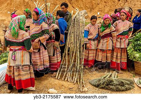 Flower Hmong People At The Ethnic Market In Can Cau, Lao Cai Province, Vietnam. View Large Photo Image Stock Photo - Flower Hmong People At The Ethnic Market In Can Cau, Lao Cai Province, Vietnam.. Fotosearch