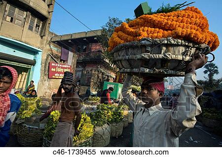 Flowers market under Howrah bridge, Kolkata, India, Ganges River. View Large Photo Image Stock Photography - Flowers market under Howrah bridge, Kolkata, India, Ganges River.. Fotosearch