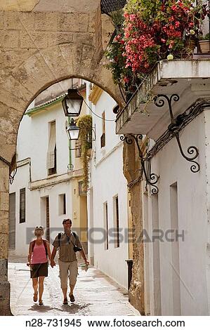 Flowers on balcony and typical street, Cordoba. Andalusia, Spain View Large Photo Image Stock Photography - Flowers on balcony and typical street, Cordoba. Andalusia, Spain. Fotosearch