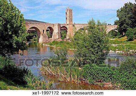 Fluvia river, medieval fortified bridge, Besalu, Catalonia, Spain View Large Photo Image Stock Image - Fluvia river, medieval fortified bridge, Besalu, Catalonia, Spain. Fotosearch