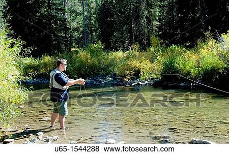 Stock Photo - Fly fisherman. Fotosearch