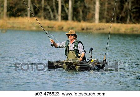Fly fishing for trout, kick boating for stillwater trout, Drakensberg, KwaZulu-Natal, South Africa View Large Photo Image Stock Image - Fly fishing for trout, kick boating for stillwater trout, Drakensberg, KwaZulu-Natal, South Africa. Fotosearch