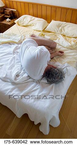 Stock Image - Foetal position.. Fotosearch