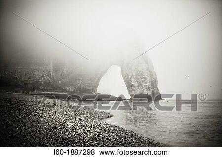 Fog in Etretat, Normandy, France View Large Photo Image Stock Photo - Fog in Etretat, Normandy, France. Fotosearch