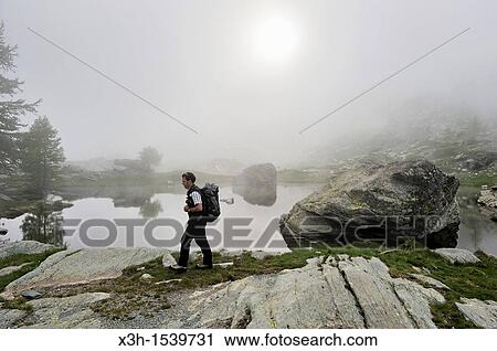 fog over Twin Lakes in Fontanalba, Mercantour National Park Alpes-Maritimes department, Provence-Alpes-Cote d? Azur region, southeast of France, Europe View Large Photo Image Stock Image - fog over Twin Lakes in Fontanalba, Mercantour National Park Alpes-Maritimes department, Provence-Alpes-Cote d? Azur region, southeast of France, Europe. Fotosearch