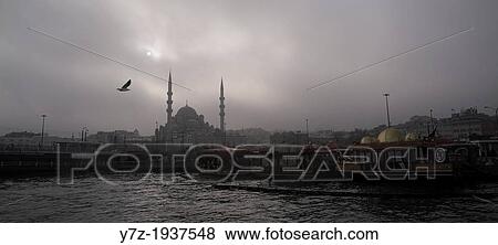 Foggy morning in Istanbul. The New Mosque in the background. View Large Photo Image Stock Photo - Foggy morning in Istanbul. The New Mosque in the background.. Fotosearch