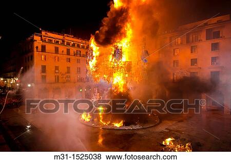 Foguera monument at City hall burning at san Joan night, Hogueras de San Juan, Fogueres de Sant Joan festival Alicante City, Costa Blanca, Spain, Europe View Large Photo Image Stock Photo - Foguera monument at City hall burning at san Joan night, Hogueras de San Juan, Fogueres de Sant Joan festival Alicante City, Costa Blanca, Spain, Europe. Fotosearch