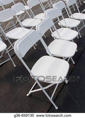 Folding chairs at an outdoor event in Providence, Rhode Island, USA View Large Photo Image Stock Image - Folding chairs at an outdoor event in Providence, Rhode Island, USA. Fotosearch