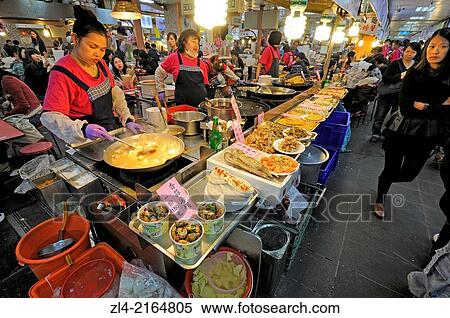 Stock Photography - Food court and restaurants in the large Shilin night market. Taiwan (China), Taipei, Datong district, Dadaocheng, Dihua street.. Fotosearch