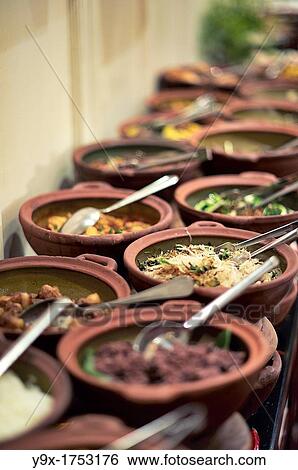 Food displayed in a buffet at the Metropole hotel in Vietnam View Large Photo Image Stock Photograph - Food displayed in a buffet at the Metropole hotel in Vietnam. Fotosearch