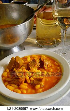 Food:? fabada? (Spanish beans stew) with cider, Way of St James, Galicia, Spain View Large Photo Image Stock Photo - Food:? fabada? (Spanish beans stew) with cider, Way of St James, Galicia, Spain. Fotosearch