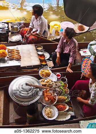 Food sellers in Damnoen Saduak floating market, 100 km away from Bangkok Thailand. View Large Photo Image Stock Photography - Food sellers in Damnoen Saduak floating market, 100 km away from Bangkok Thailand.. Fotosearch
