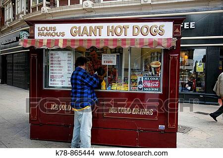 Food stall selling traditional steak and sausage, Manchester, England, UK View Large Photo Image Picture - Food stall selling traditional steak and sausage, Manchester, England, UK. Fotosearch