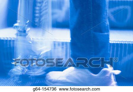 Foot and scooter on escalator View Large Photo Image Stock Photograph - Foot and scooter on escalator. Fotosearch