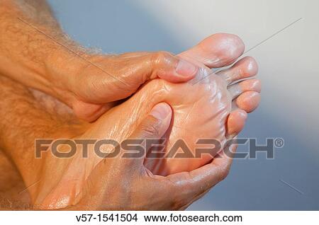 Foot massage. Close view. View Large Photo Image Picture - Foot massage. Close view.. Fotosearch