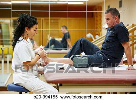 Foot mobilization, reeducation exercise, rebahilitation. Policlinica Gipuzkoa, San Sebastian, Donostia, Euskadi, Spain View Large Photo Image Stock Photography - Foot mobilization, reeducation exercise, rebahilitation. Policlinica Gipuzkoa, San Sebastian, Donostia, Euskadi, Spain. Fotosearch