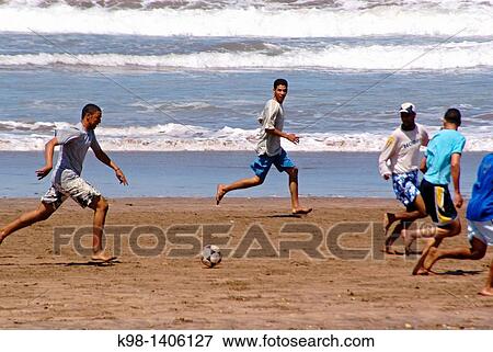 Football match on the beach Costa Atlantica Azzemour Morocco Maghreb Africa View Large Photo Image Stock Photo - Football match on the beach Costa Atlantica Azzemour Morocco Maghreb Africa. Fotosearch