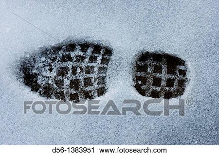 Stock Image - Footprint on the snow. Fotosearch