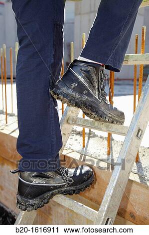 Footwear for professional use, Protective boots, construction worker, Ladder, Donostia, San Sebastian, Gipuzkoa, Basque Country, Spain View Large Photo Image Stock Image - Footwear for professional use, Protective boots, construction worker, Ladder, Donostia, San Sebastian, Gipuzkoa, Basque Country, Spain. Fotosearch