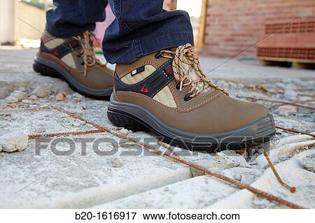 Footwear for professional use, Protective boots, construction worker, Donostia, San Sebastian, Gipuzkoa, Basque Country, Spain View Large Photo Image Stock Photo - Footwear for professional use, Protective boots, construction worker, Donostia, San Sebastian, Gipuzkoa, Basque Country, Spain. Fotosearch