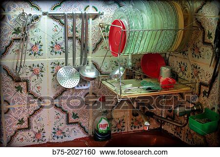 foreground of the corner of an old kitchen sink with drainer full of clean dishes and tidy View Large Photo Image Stock Image - foreground of the corner of an old kitchen sink with drainer full of clean dishes and tidy. Fotosearch