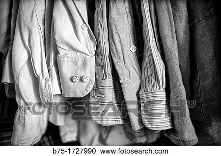 foreground shirtsleeves in a wardrobe, View Large Photo Image Stock Image - foreground shirtsleeves in a wardrobe,. Fotosearch