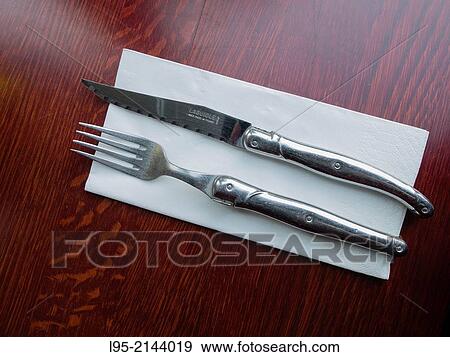 Fork and knife of the Laguiole-style in a restaurant, Paris, France. View Large Photo Image Stock Photo - Fork and knife of the Laguiole-style in a restaurant, Paris, France.. Fotosearch