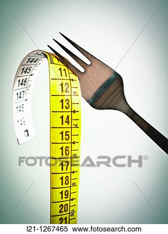 Fork and measuring tape View Large Photo Image Stock Photography - Fork and measuring tape. Fotosearch