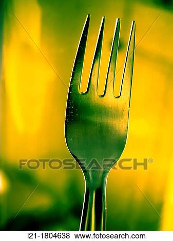 Fork. Yellow and orange background. View Large Photo Image Stock Photo - Fork. Yellow and orange background.. Fotosearch