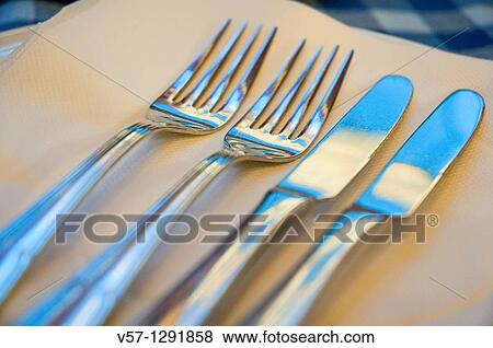 Forks and knives. Close view. View Large Photo Image Stock Photo - Forks and knives. Close view.. Fotosearch