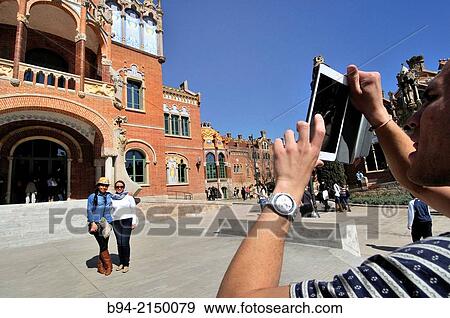 Stock Photo - Former Hospital de la Santa Creu i Sant Pau, built between 1901 and 1930, designed by the Catalan modernist architect Llu's Dom? nech i Montaner. UNESCO World Heritage Site. Barcelona.. Fotosearch