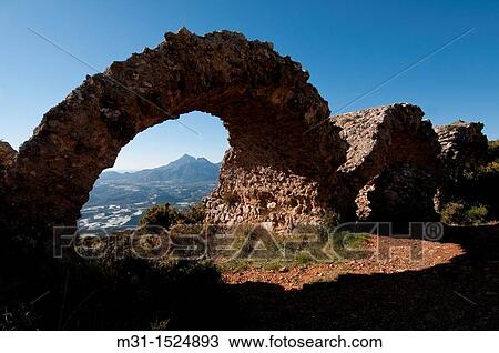 Stock Image - Fort Bernia s a fortress on the highest part of the Sierra de Bernia It was built in the 17th century on the orders of King Felipe II to prevent attacks of the Moors. Fotosearch
