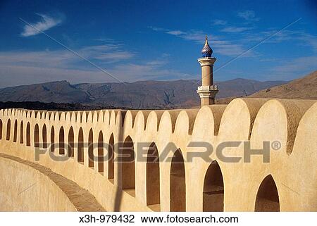 Fortress and mosque of Nizwa, Sultanat of Oman, Arabian Peninsula, Southwest Asia View Large Photo Image Stock Image - Fortress and mosque of Nizwa, Sultanat of Oman, Arabian Peninsula, Southwest Asia. Fotosearch