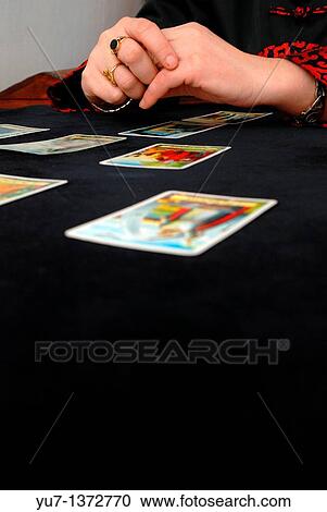 Fortune teller reading the tarot cards View Large Photo Image Stock Image - Fortune teller reading the tarot cards. Fotosearch