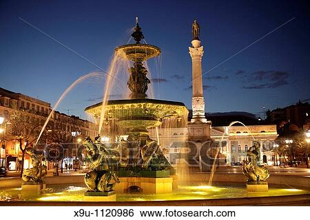fountain and Statue of King D Pedro IV on the square Praca de Dom Pedro IV or Rossio in Lisbon, Portugal, Europe View Large Photo Image Stock Photograph - fountain and Statue of King D Pedro IV on the square Praca de Dom Pedro IV or Rossio in Lisbon, Portugal, Europe. Fotosearch