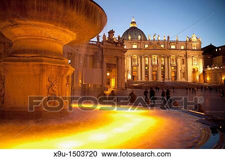 fountain and the illuminated St Peter's Basilica and St Peter's Square at the blue hour, Rome, Italy, Europe View Large Photo Image Stock Image - fountain and the illuminated St Peter's Basilica and St Peter's Square at the blue hour, Rome, Italy, Europe. Fotosearch