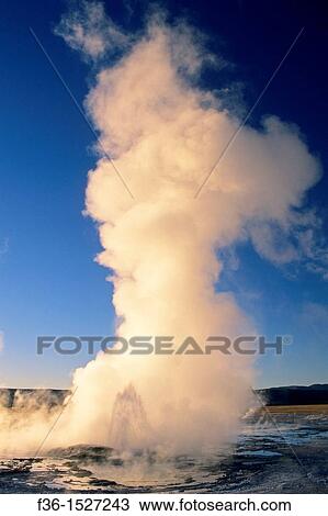 Stock Image - Fountain Geyser at sunset, Fountain Paint Pot area, Yellowstone National Park, Wyoming. Fotosearch