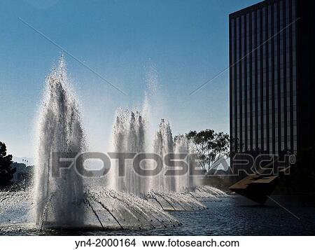 Fountains and pool next to the department of water and power building in downtown Los Angeles. View Large Photo Image Picture - Fountains and pool next to the department of water and power building in downtown Los Angeles.. Fotosearch