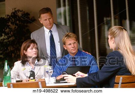four at a business lunch View Large Photo Image Stock Image - four at a business lunch. Fotosearch