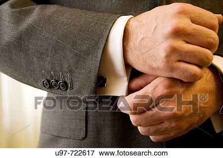 Four buttons on cuff, one unbuttoned View Large Photo Image Stock Photo - Four buttons on cuff, one unbuttoned. Fotosearch