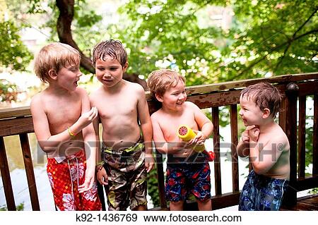 Four children playing together. View Large Photo Image Stock Photo - Four children playing together.. Fotosearch
