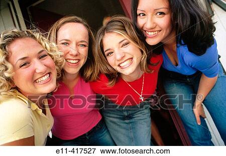 Four college roommates outside. View Large Photo Image Stock Photo - Four college roommates outside.. Fotosearch