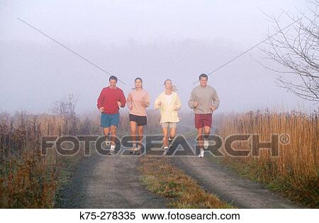 Stock Photography - four friends jogging. Fotosearch