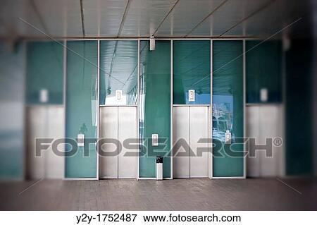 Four lifts in? Veles e Vent? building in Port of Valencia, Spain, with photographer selfportrait View Large Photo Image Stock Photo - Four lifts in? Veles e Vent? building in Port of Valencia, Spain, with photographer selfportrait. Fotosearch
