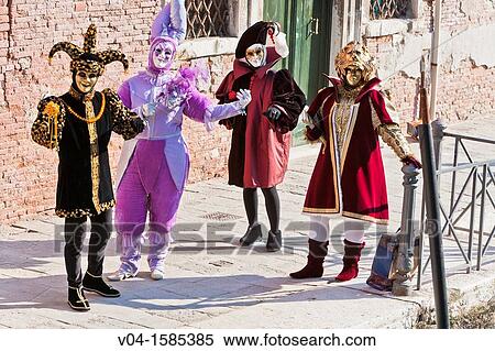 Four masked people at the carnival in Venice, Italy, Europe View Large Photo Image Stock Photography - Four masked people at the carnival in Venice, Italy, Europe. Fotosearch