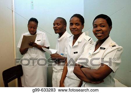 Four nurses pose in an office at the Howard Hospital outpatient department. Some of the nurses attend the training centre. The hospital is located in northern Zimbabwe. View Large Photo Image Stock Image - Four nurses pose in an office at the Howard Hospital outpatient department. Some of the nurses attend the training centre. The hospital is located in northern Zimbabwe.. Fotosearch