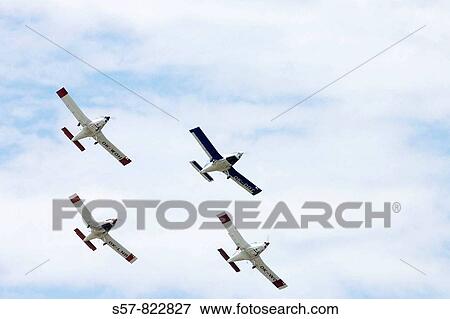 four planes at airshow View Large Photo Image Stock Photo - four planes at airshow. Fotosearch