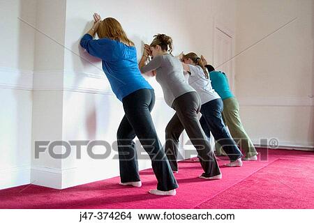 Four pregnant ladies in a pre natal yoga class View Large Photo Image Picture - Four pregnant ladies in a pre natal yoga class. Fotosearch